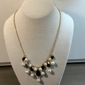 20 inch gold toned statement necklace with faux pearls